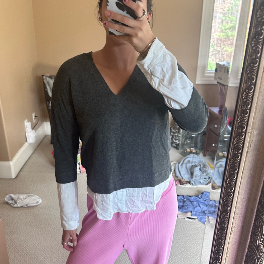 Gray sweater, M/L brand is Feel The Piece